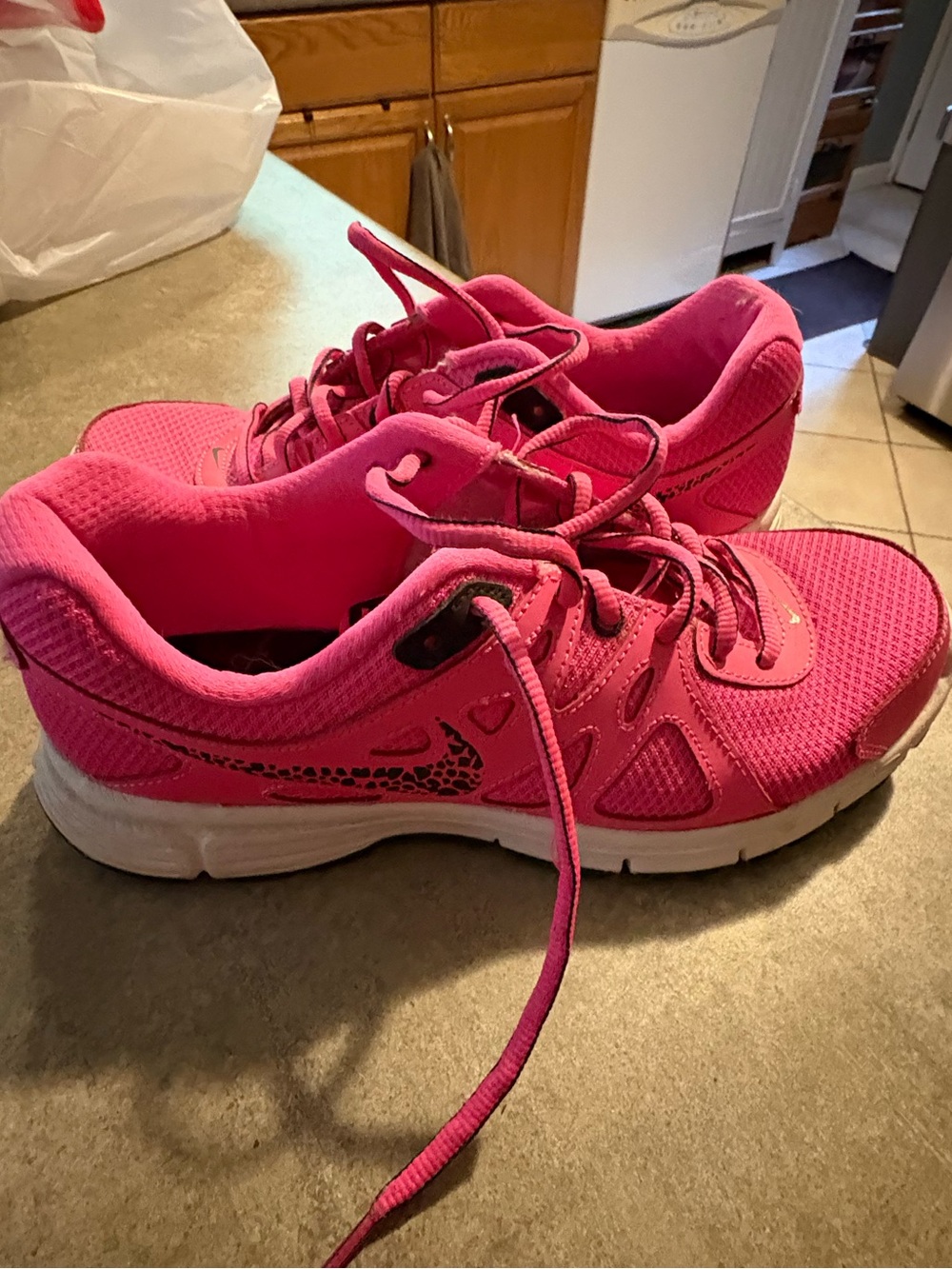 Women’s Pink Nike (w/ cheetah print)